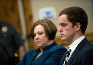 John R. K. Howard gets away with kicking coat hanger up the rectum of a mentally disabled black teammate