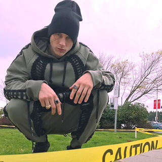 What Happened To MGK’s Face?